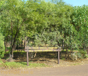 Tours group camp at on end and other camping at the other end.