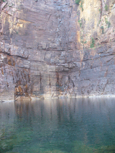 The main pool at the bottom of the Gorge. In the topical  summer or green season the falls pound over the cliffs here at Jim Jim Gorge